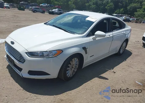 2013 Ford Fusion Hybrid Se z USA, uszkodzony, nr VIN 3FA6P0LU3DR328786